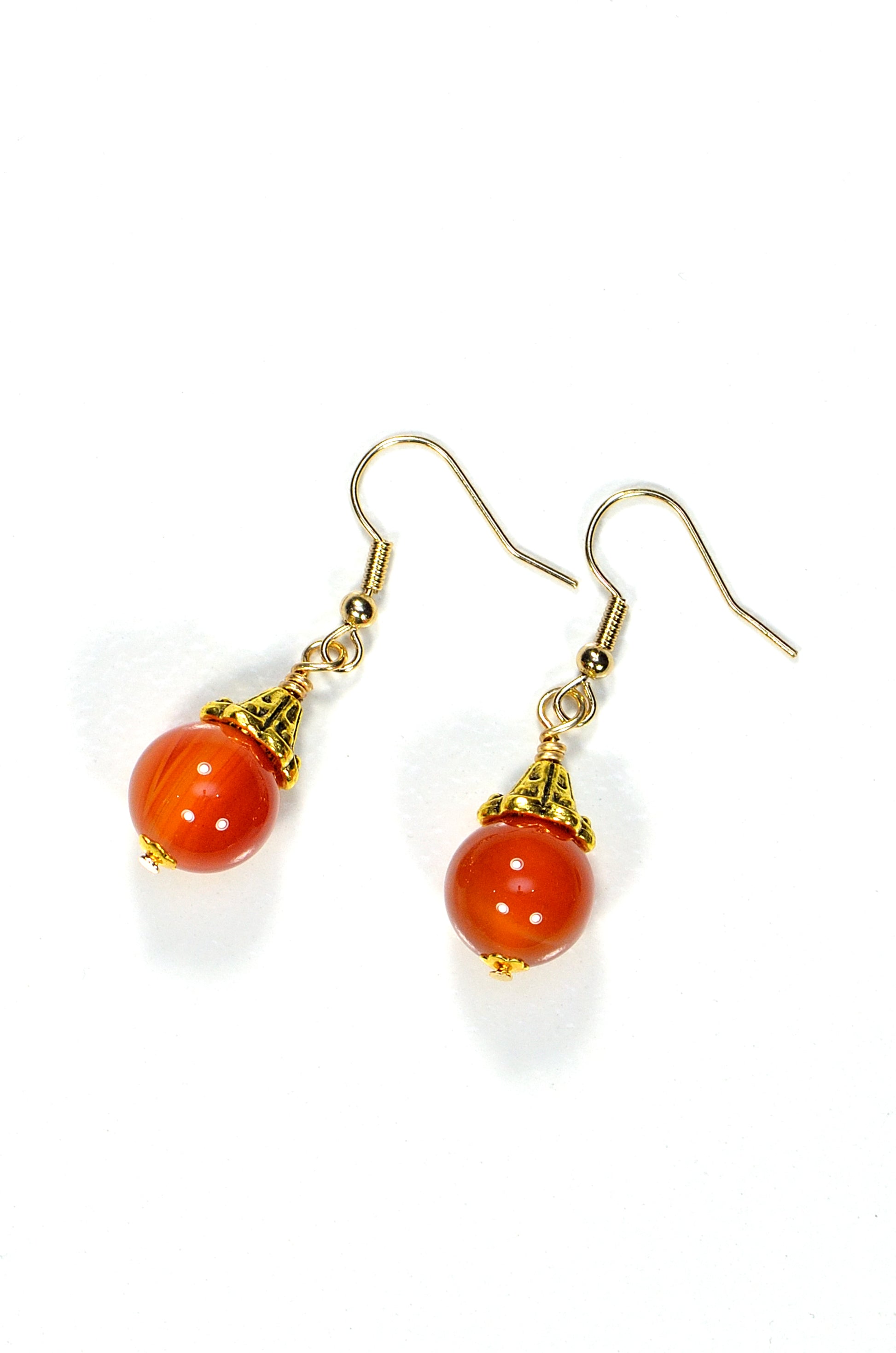 Top view of 12mm Natural Carnelian Crystal Drop Earrings.
