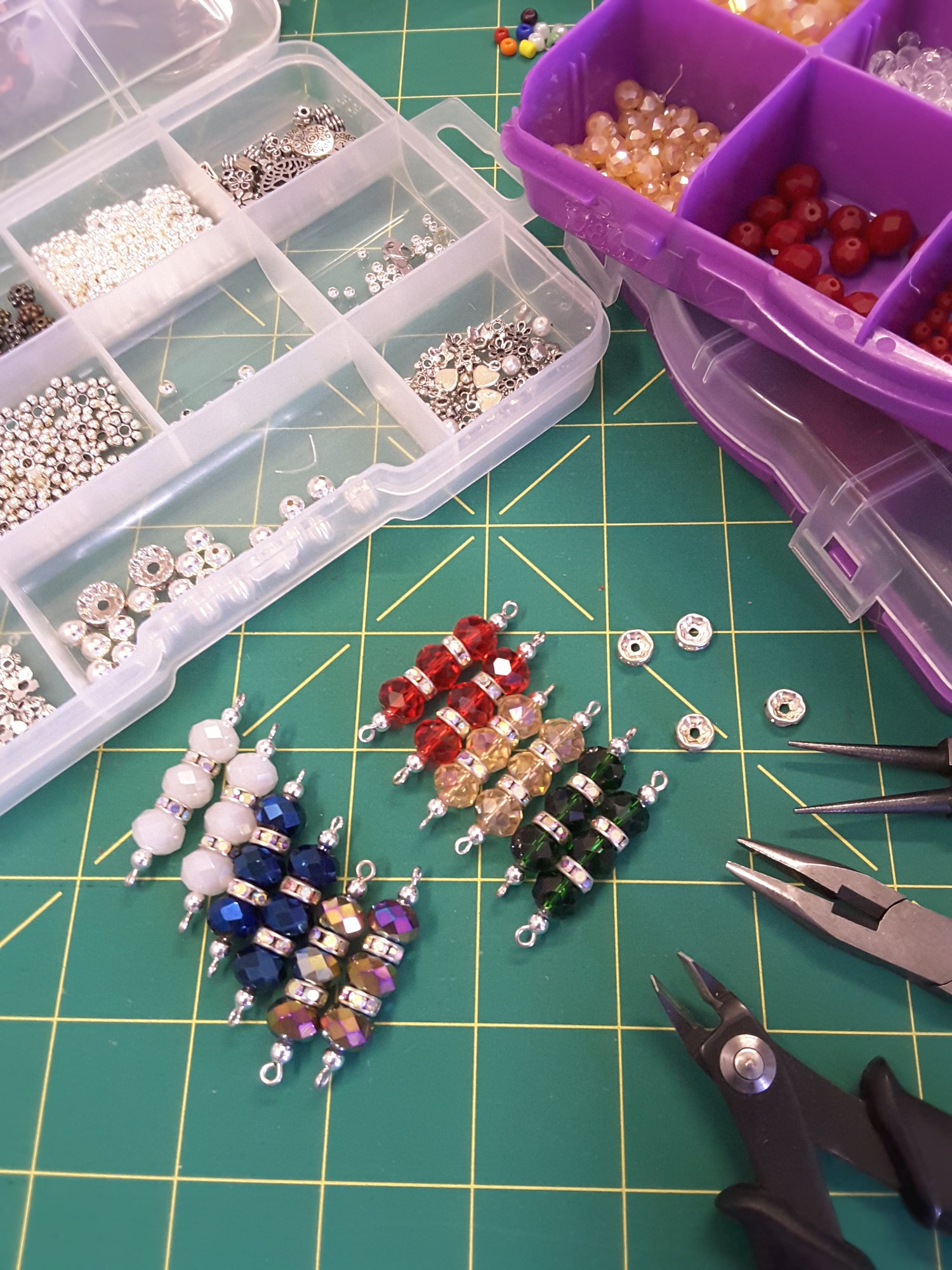 Colourful beads and jewelry making tools.