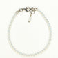 Top view of 3mm Clear White Opalite Anklet on white background.