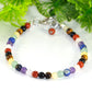 4mm Chakra Gemstone Anklet made with 4mm natural rose quartz, lapis lazuli, amethyst, green aventurine, calcite, tiger's eye, black obsidian and red jasper crystal beads strung on sturdy beading wire, finished with a lobster clasp.