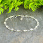 4mm Clear Quartz Link Bracelet with lobster claw clasp.