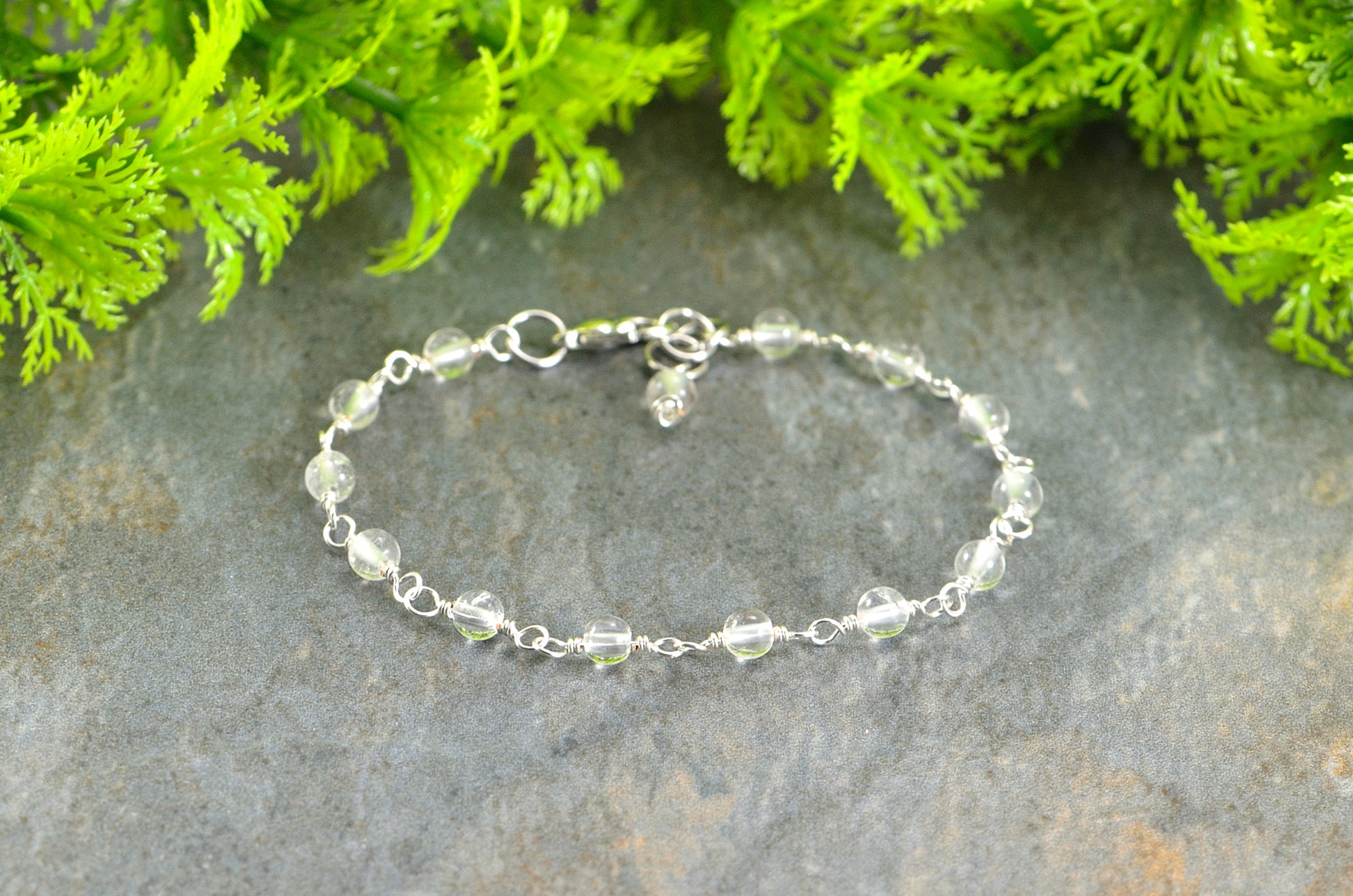 4mm Clear Quartz Link Bracelet with lobster claw clasp.
