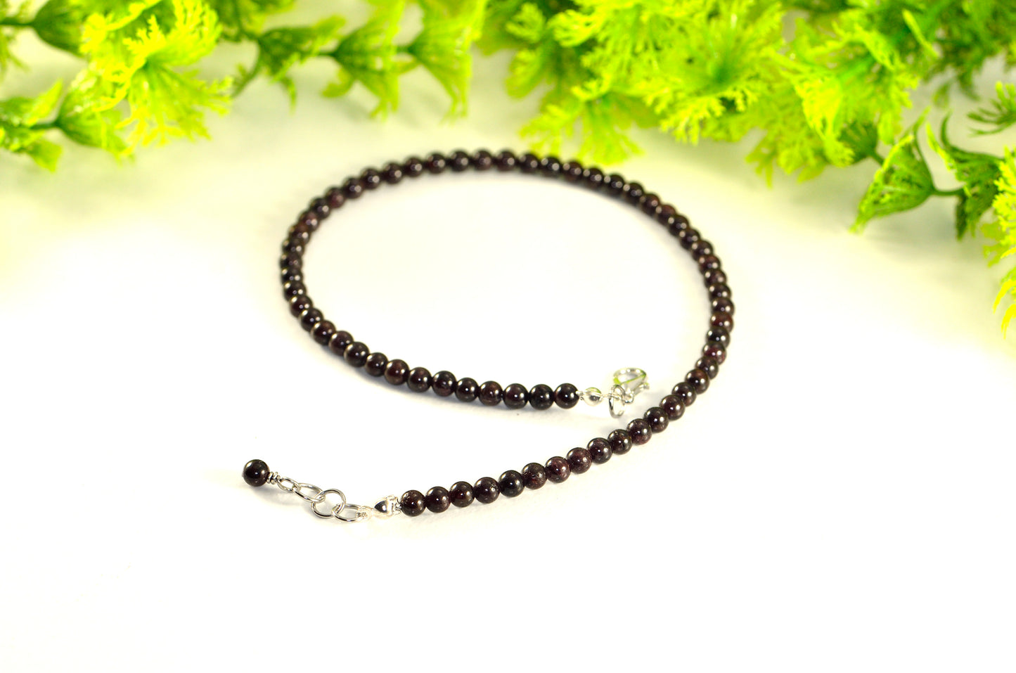 Close up of 4mm Garnet Crystal Choker Necklace.