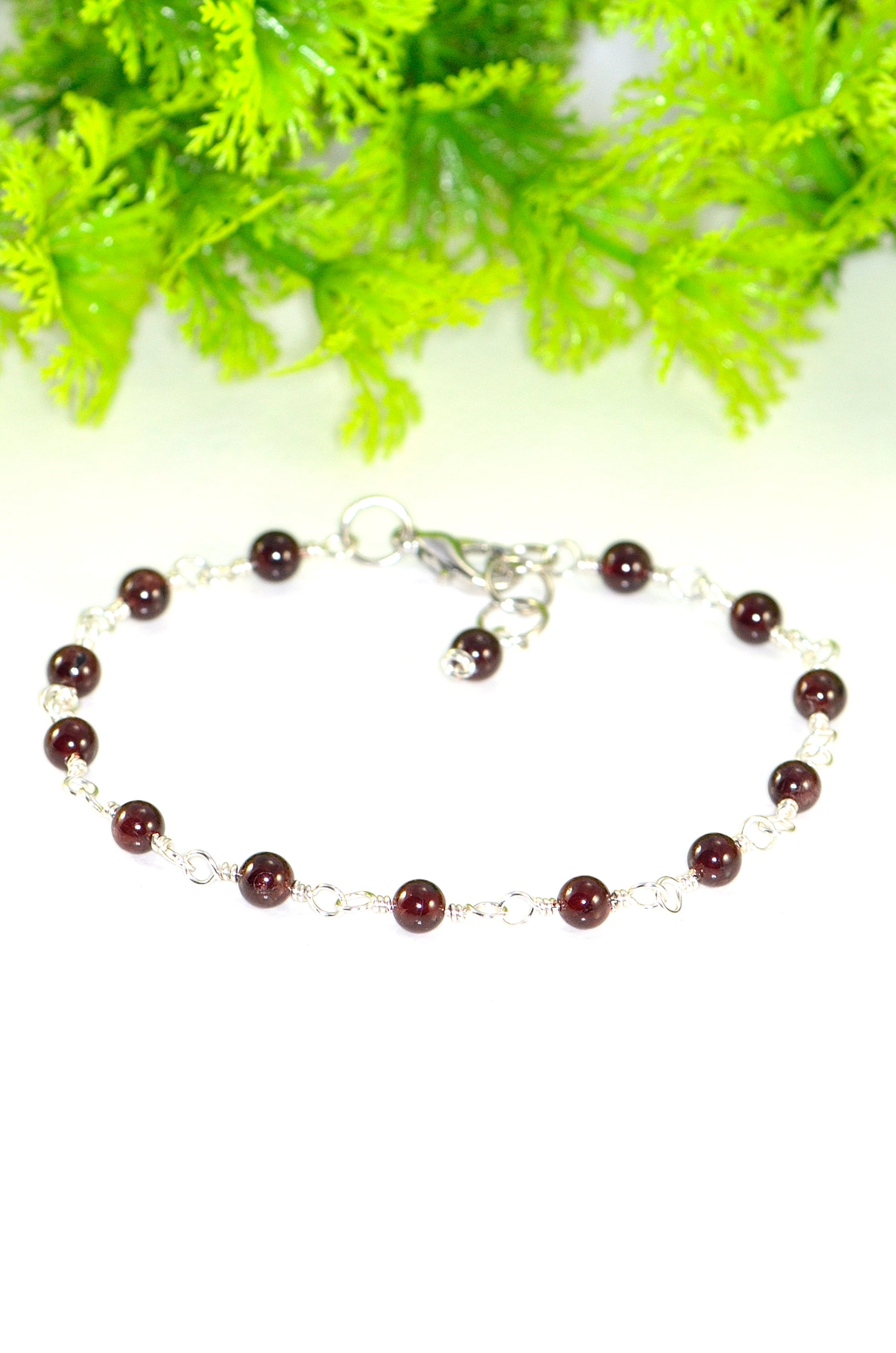 Close up of 4mm Garnet Link Anklet.
