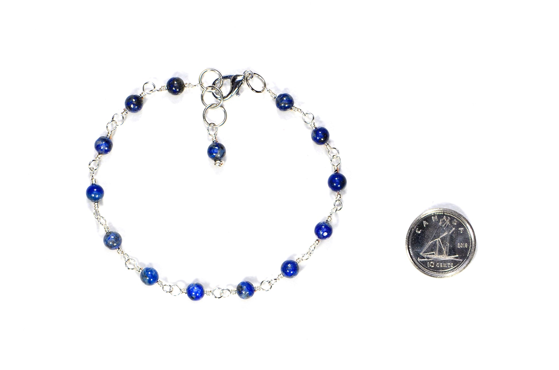 4mm Lapis Lazuli Link Chain Anklet beside a dime.