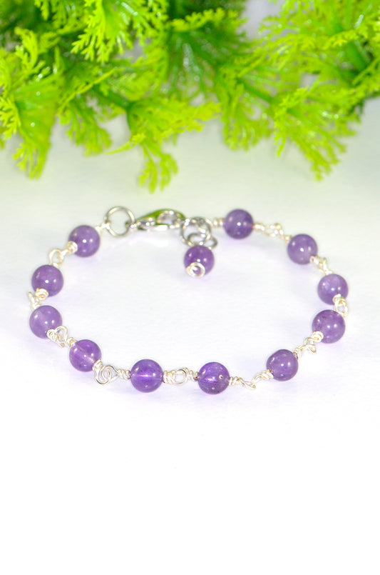 Close up of 6mm Amethyst Link Bracelet.