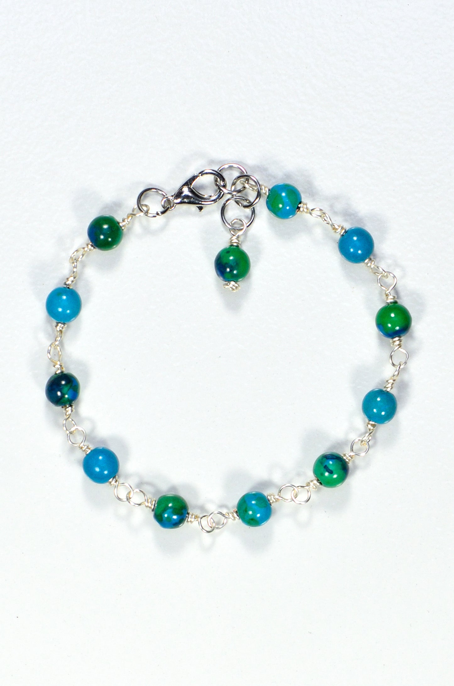 Top view of 6mm Blue Jade Link Bracelet.