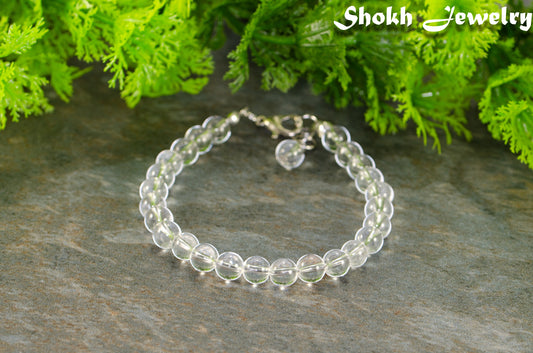6mm Clear Quartz Beaded Bracelet with clasp and a dangle.
