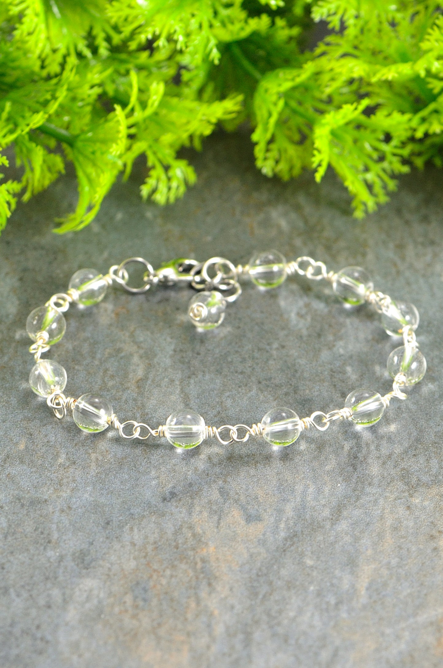 Close up of  6mm Clear Quartz Link Bracelet.