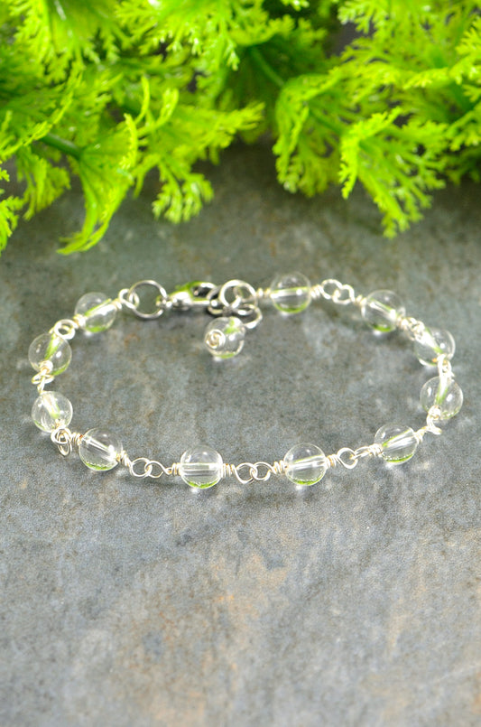 Close up of  6mm Clear Quartz Link Bracelet.