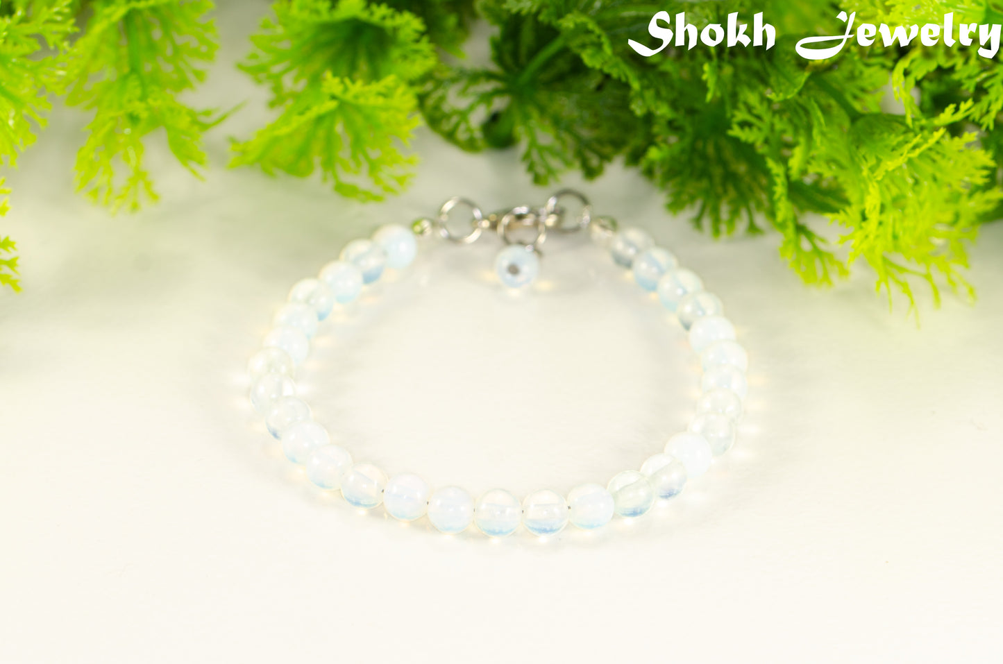 6mm Clear White Opalite Beaded Anklet on white background.