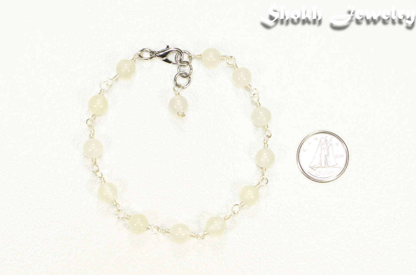 6mm Green Jade Link Anklet beside a dime.