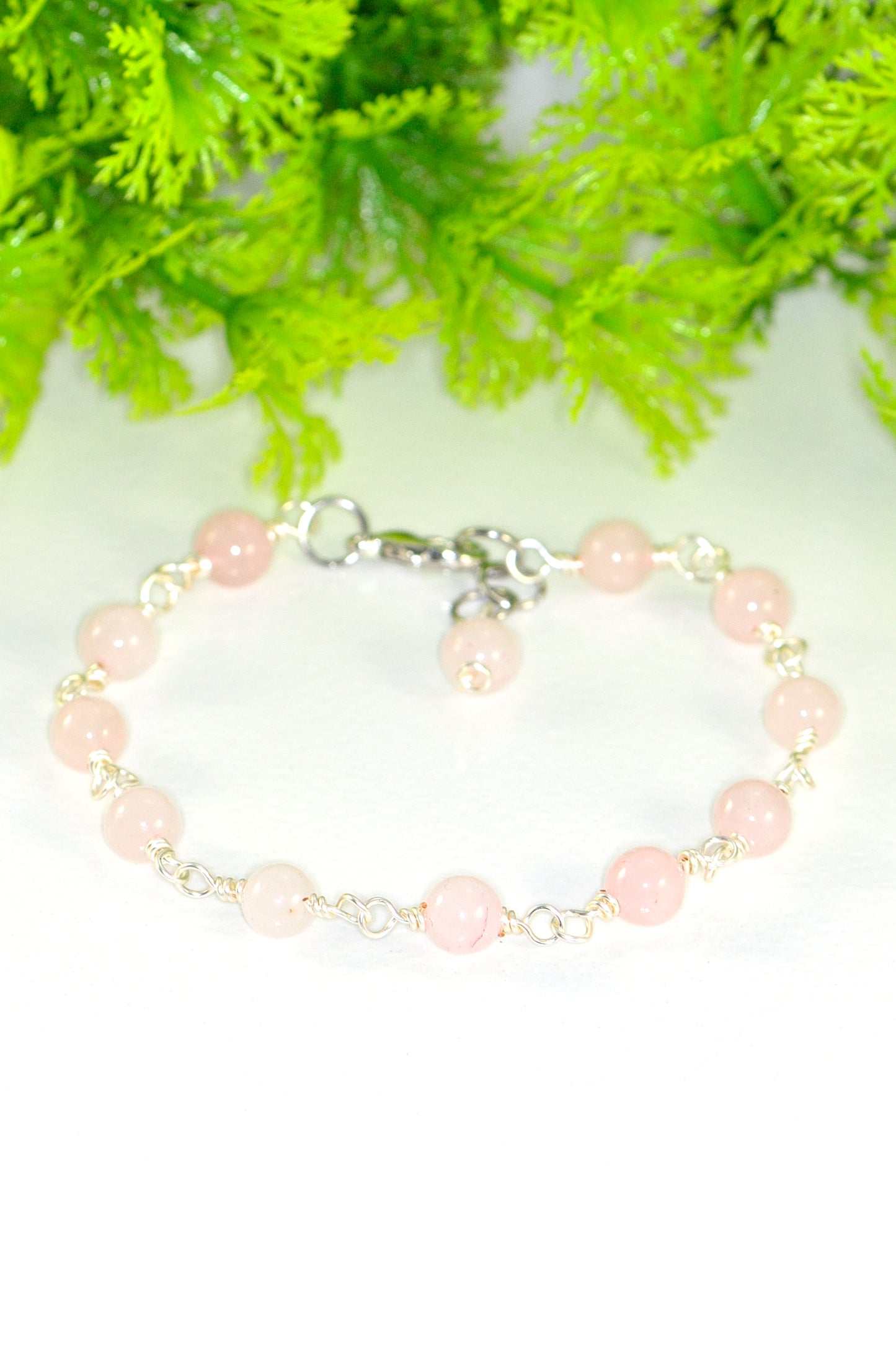 Close up of 6mm Rose Quartz Link Bracelet.