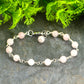 Close up of 6mm Rose Quartz Link Bracelet.