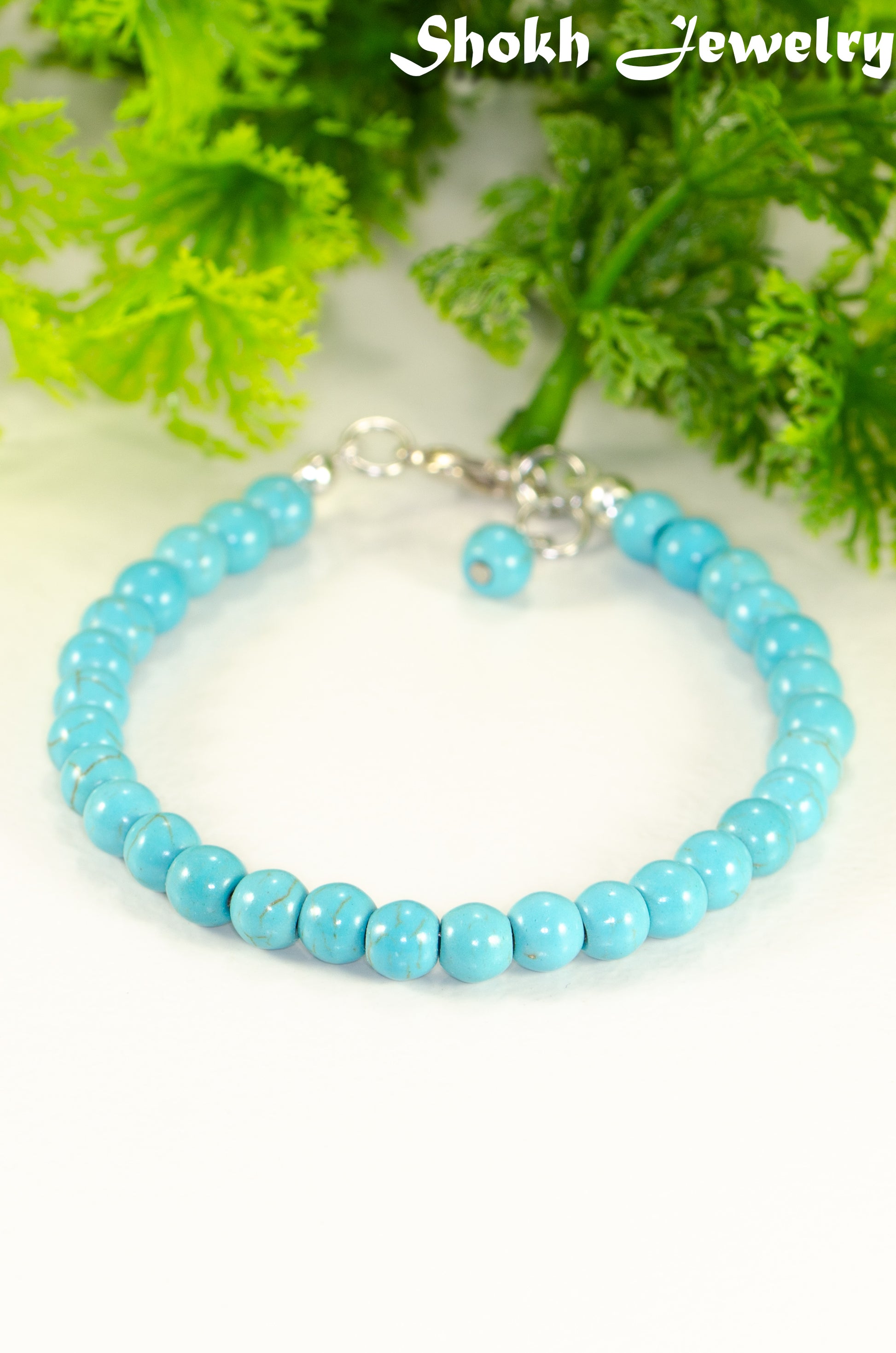 6mm Turquoise Howlite Beaded Anklet with clasp and a dangle.