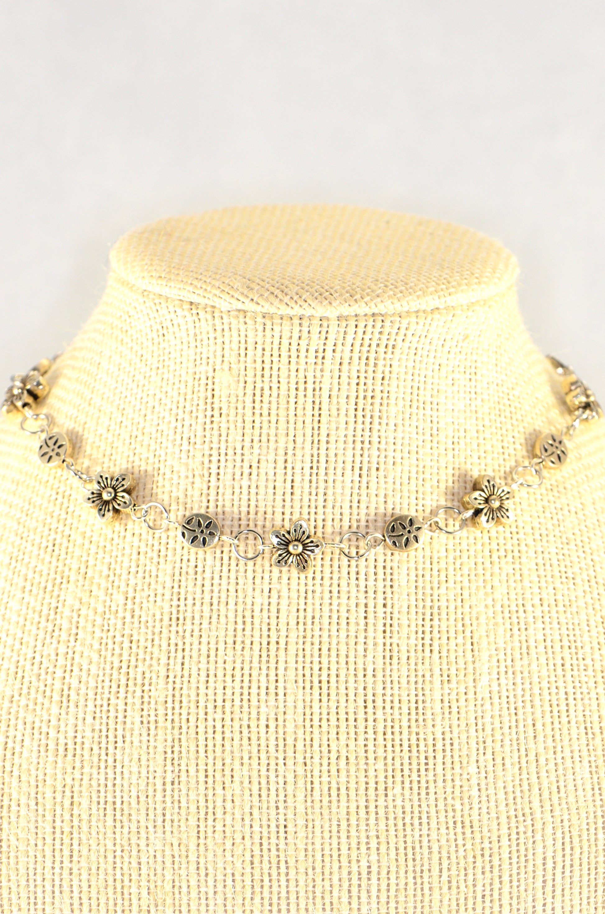 Close up of Chunky Tibetan Silver Flower Choker Necklace.