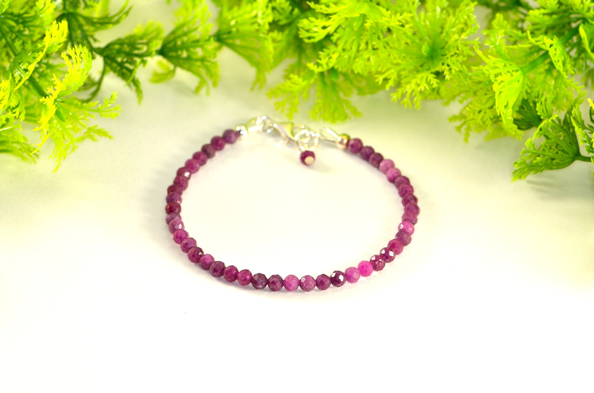 Faceted Ruby Bracelet with Sterling Silver Clasp and a cute little dangle.