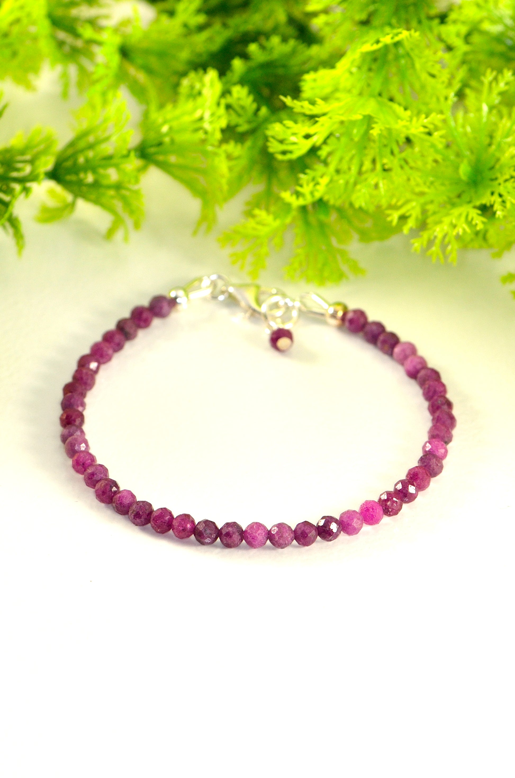 Close up of Faceted Ruby Bracelet with Sterling Silver Clasp.