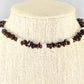 Freshwater Pearls and Garnet Crystal Chip Choker Necklace displayed on a bust.