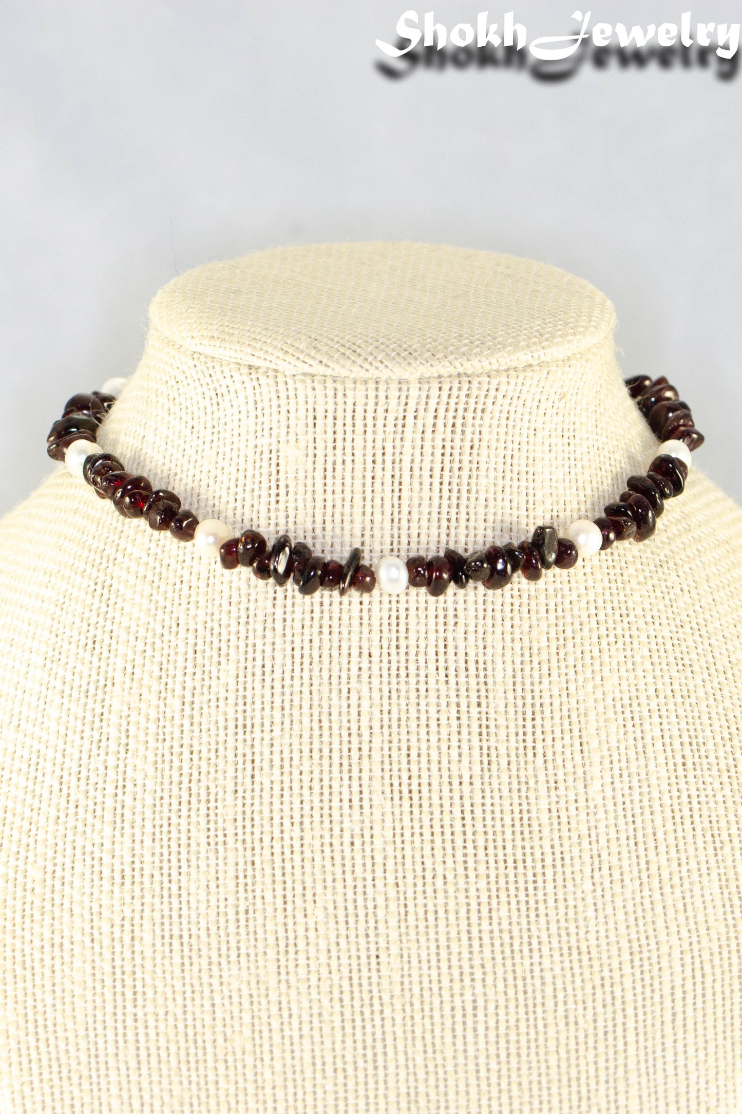 Close p of Freshwater Pearls and Garnet Crystal Chip Choker Necklace.