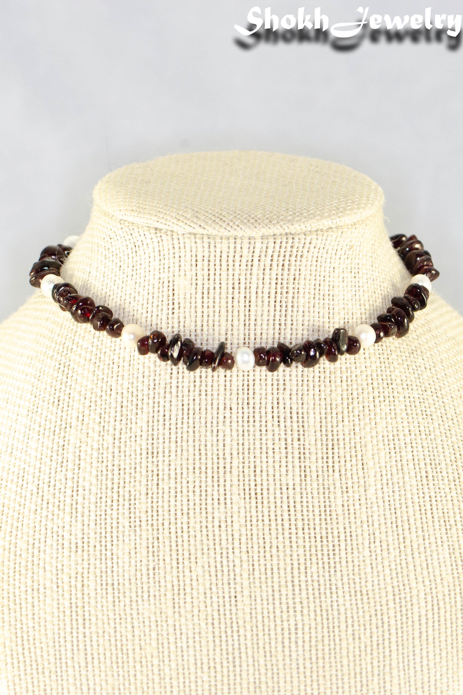 Close p of Freshwater Pearls and Garnet Crystal Chip Choker Necklace.