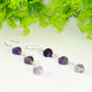 Close up of Natural Amethyst Heart Dangle Earrings.