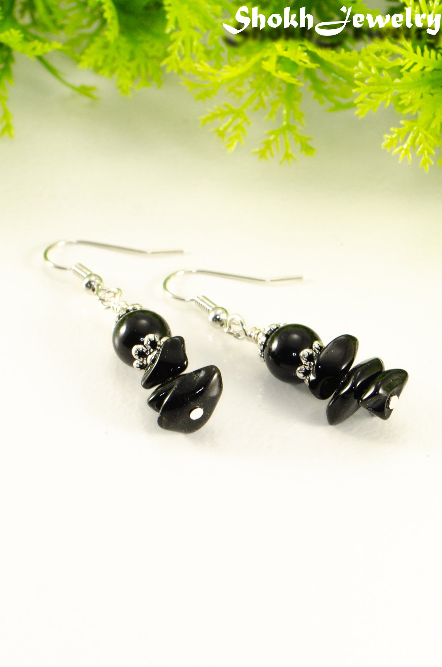 Close up of Simple Black Obsidian Crystal Chip Earrings.