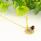 Gold Plated January Birth Flower Necklace with Garnet Birthstone Pendant.