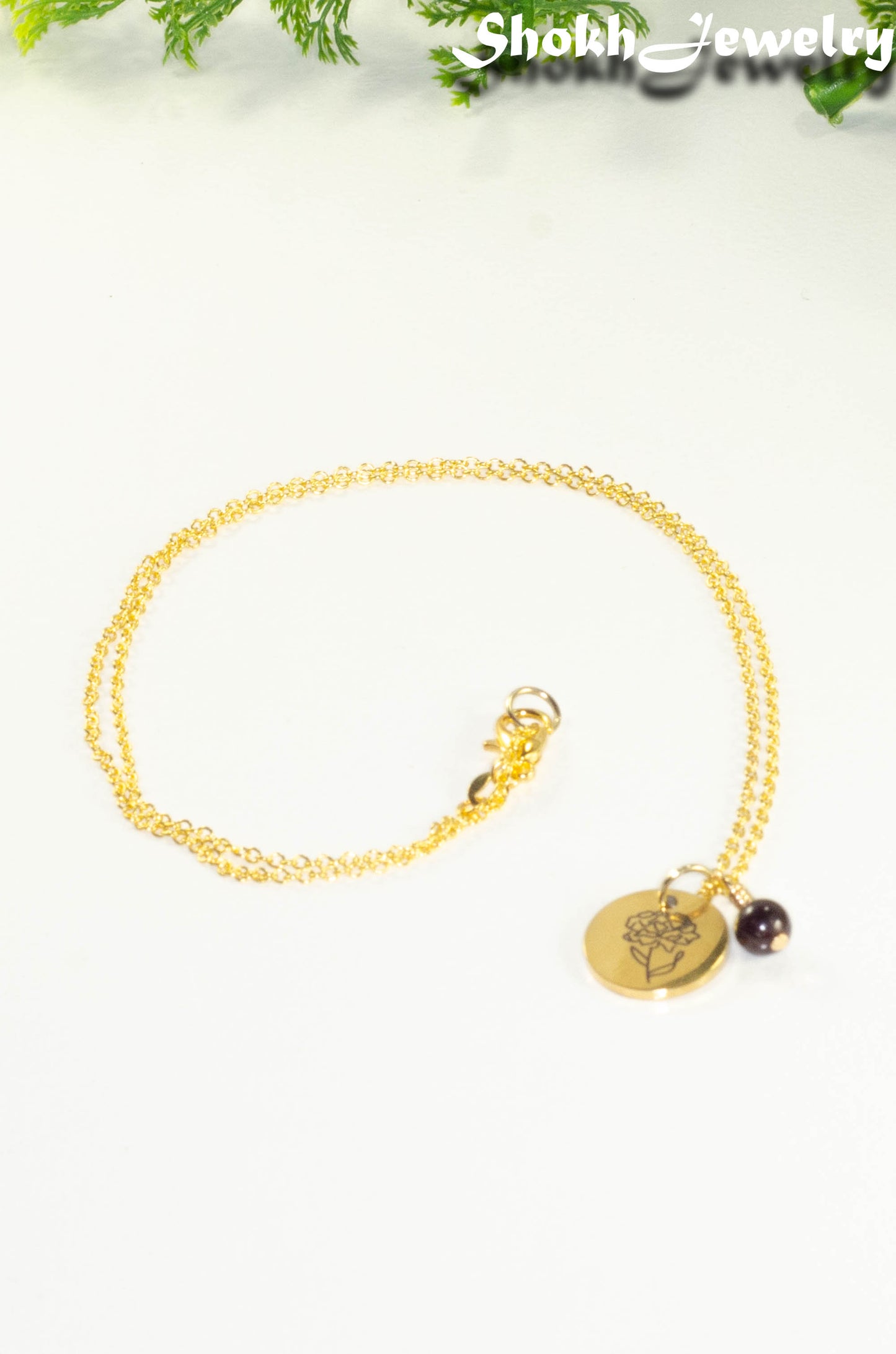 Gold Plated January Birth Flower Necklace with Garnet Birthstone Pendant.