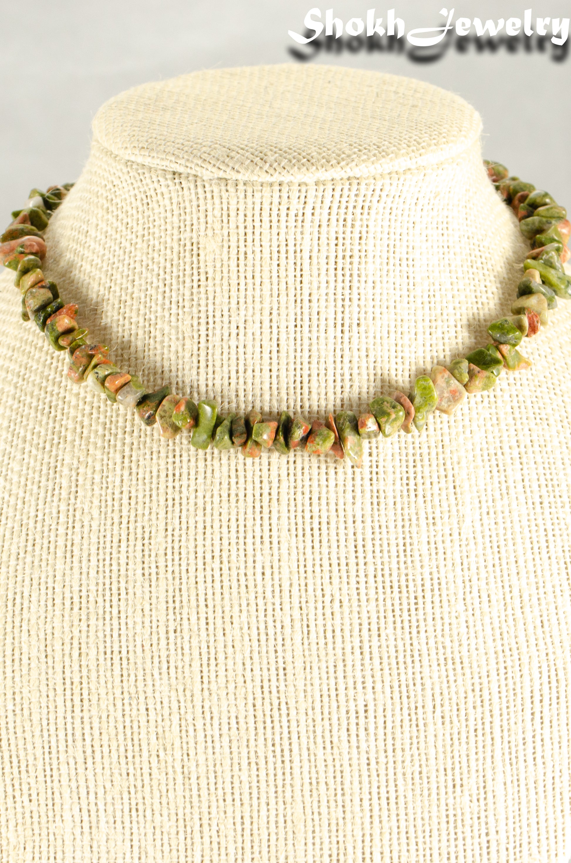 Natural Unakite Crystal Chip Choker Necklace displayed on a bust.