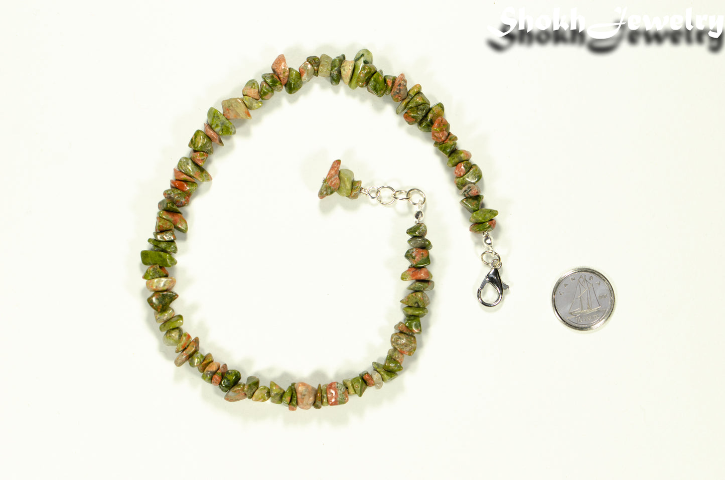Natural Unakite Crystal Chip Anklet beside a dime.