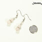 Small Rose Quartz Earrings beside a dime.