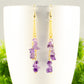 Close up of Long Gold Plated Chain and Amethyst Crystal Chip Earrings.