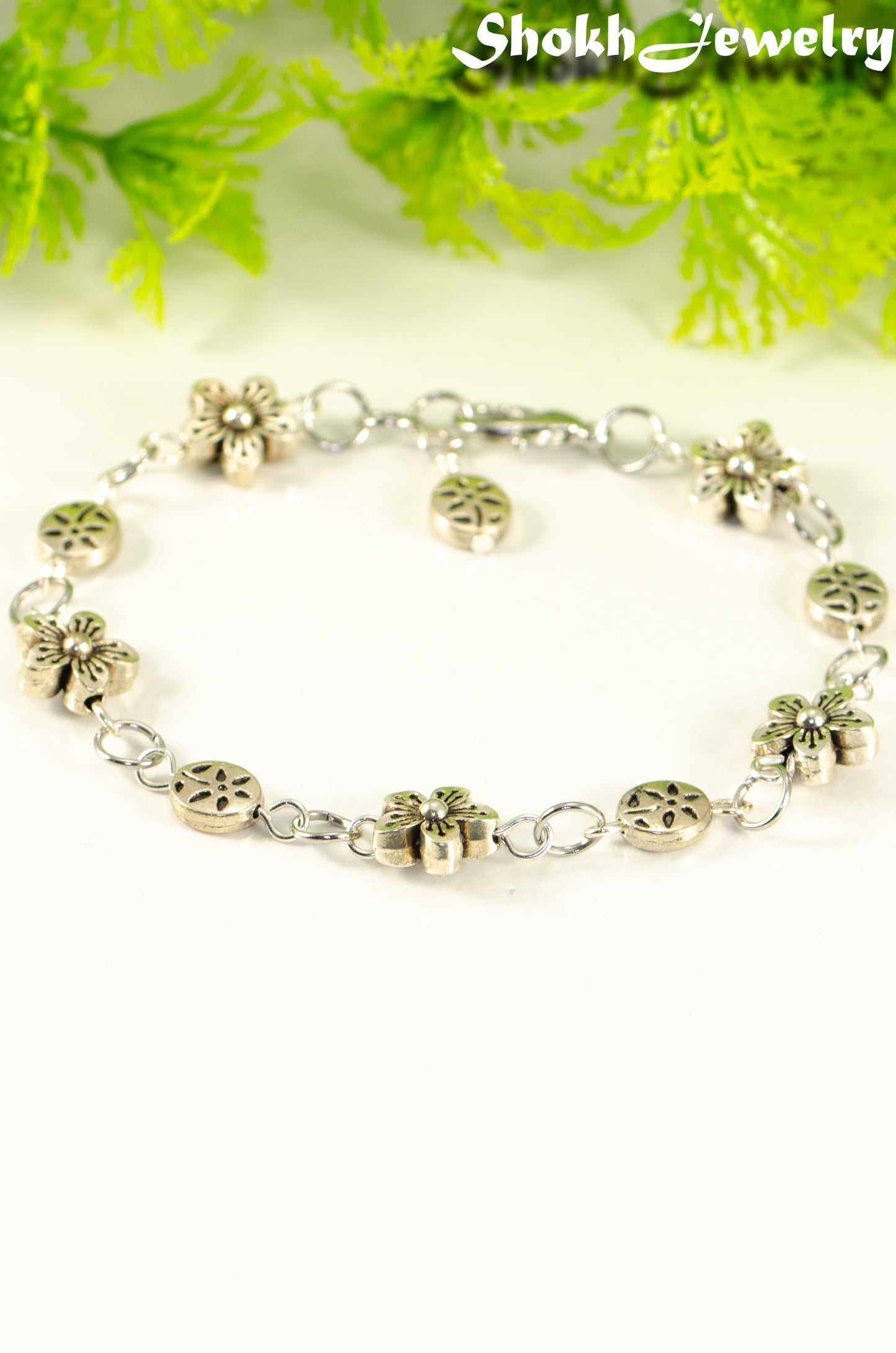 Close up of Tibetan Silver Flower Link Bracelet.