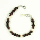 Top view of Natural Garnet Crystal Chip and Pearls Bracelet.