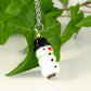 Close up of Glass Bead Snowman Pendant.