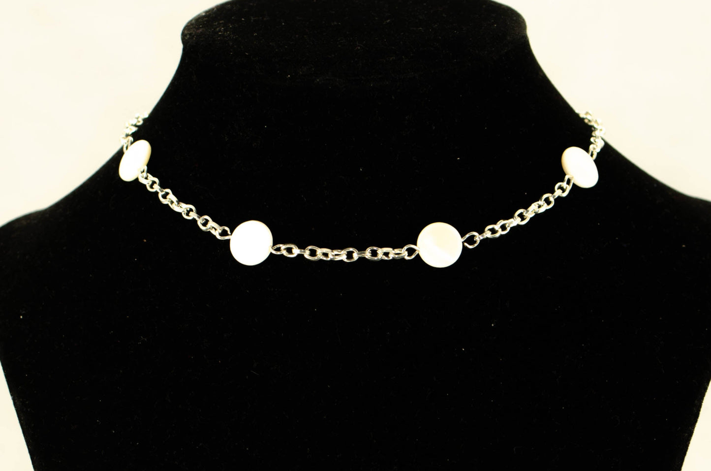 Seashell and Dainty Chain Choker Necklace displayed on a bust.