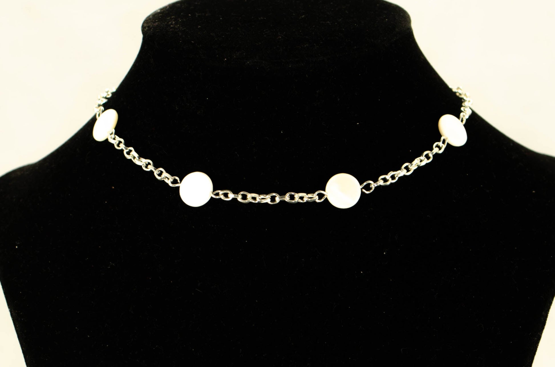 Seashell and Dainty Chain Choker Necklace displayed on a bust.