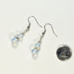 Small Opalite Crystal Earrings beside a dime.