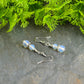Close up of Small Opalite Crystal Earrings.