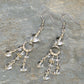 Top view of Statement Clear Quartz Chandelier Earrings.