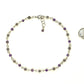 Tibetan Silver Flower and Amethyst Choker Necklace beside a dime.