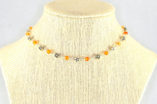 Tibetan Silver Flower and Carnelian Choker Necklace displayed on a bust.