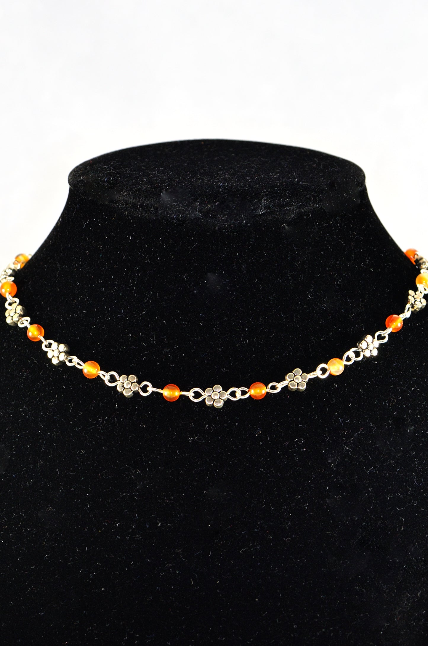 Close u of Tibetan Silver Flower and Carnelian Choker Necklace.