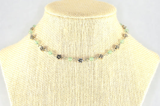 Tibetan Silver Flower and Green Aventurine Choker Necklace displayed on a bust.
