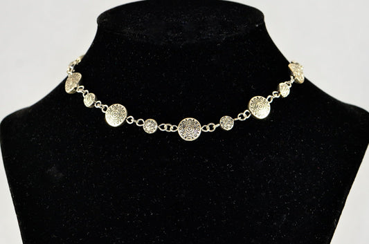 Tibetan Silver Star Sun and Moon Choker Necklace displayed on a bust.