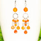 Close up of Statement Carnelian Crystal Chandelier Earrings.