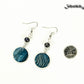 Long Blue Seashell and Pearl Earrings beside a dime.